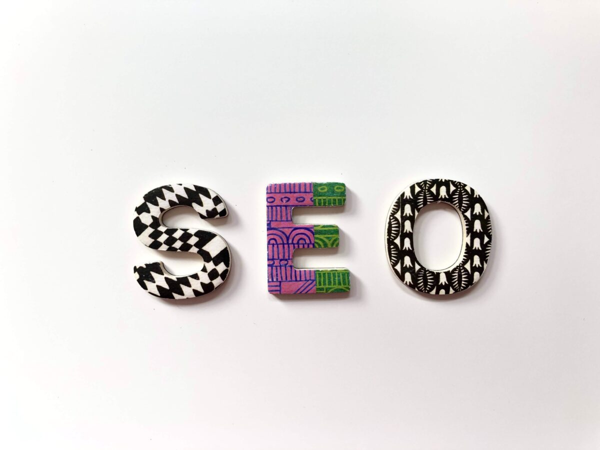 A graphic design featuring the letters 'EO used in an article about keyword research services.